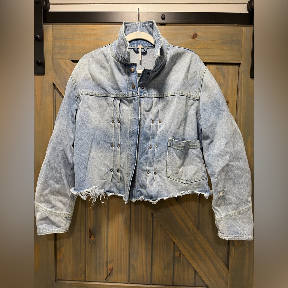 Woman’s Denim distressed Free People Jacket medium